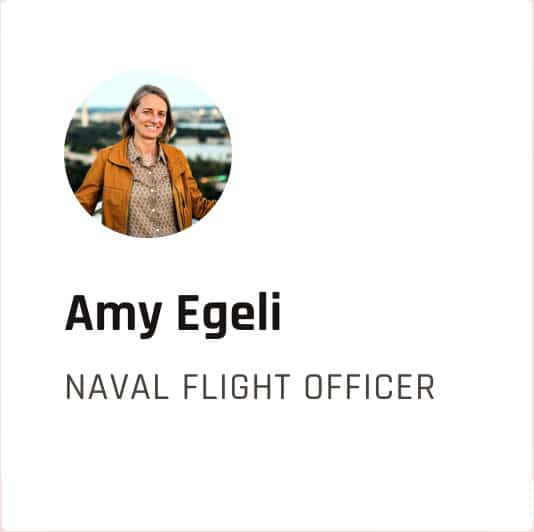 Profile card featuring a circular photo of Amy Egeli smiling in a brown jacket, with the text 'Amy Egeli' and the title 'Naval Flight Officer' underneath.