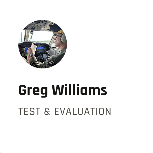 Portrait thumbnail of Greg Williams in pilot cockpit wearing a headset, with the caption 'TEST & EVALUATION'